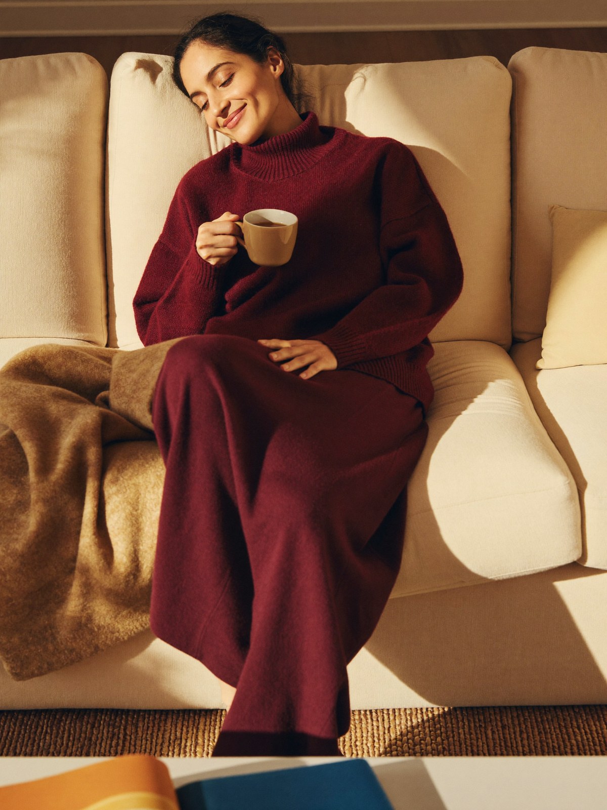 A woman resting calmly and comfortably at home during a relaxed recovery