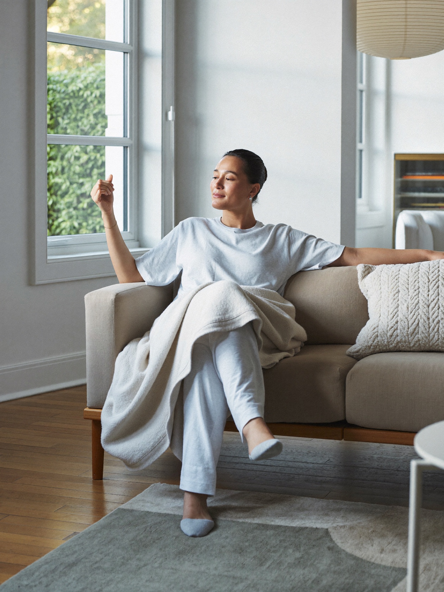 A calm adult resting comfortably at home during recovery